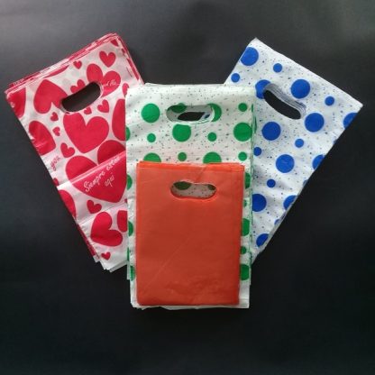bolsas de colores con manigueta